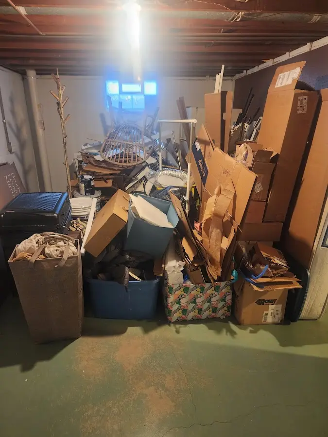 Roll-off dumpster container at job site for 2 Yard Dumpster Rental in Elgin